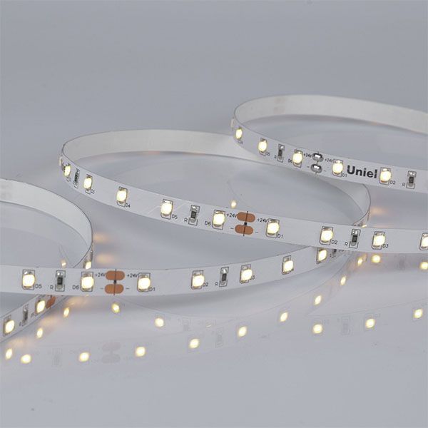Светодиодная лента Белый теплый 2835 24V  6W/m 120Led/метр UL-00002971 ULS-2835 8mm IP20