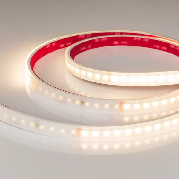 Светодиодная лента Белый теплый 2835 24V 14W/m 96Led/метр 058177 герм (PS-силиконовая экструзия) DMX-A96-14mm Warm3000-PX12